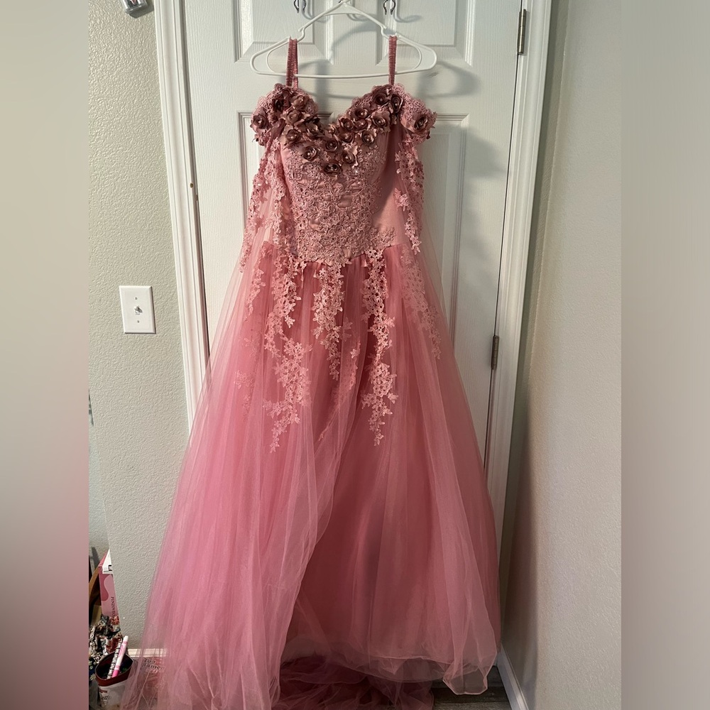 Pink/rose colored quinceañera or prom dress